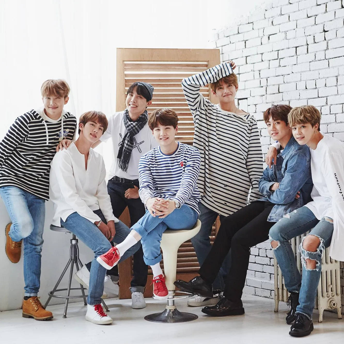 Cute Bts Group Posing Together By The Cabin Wallpaper