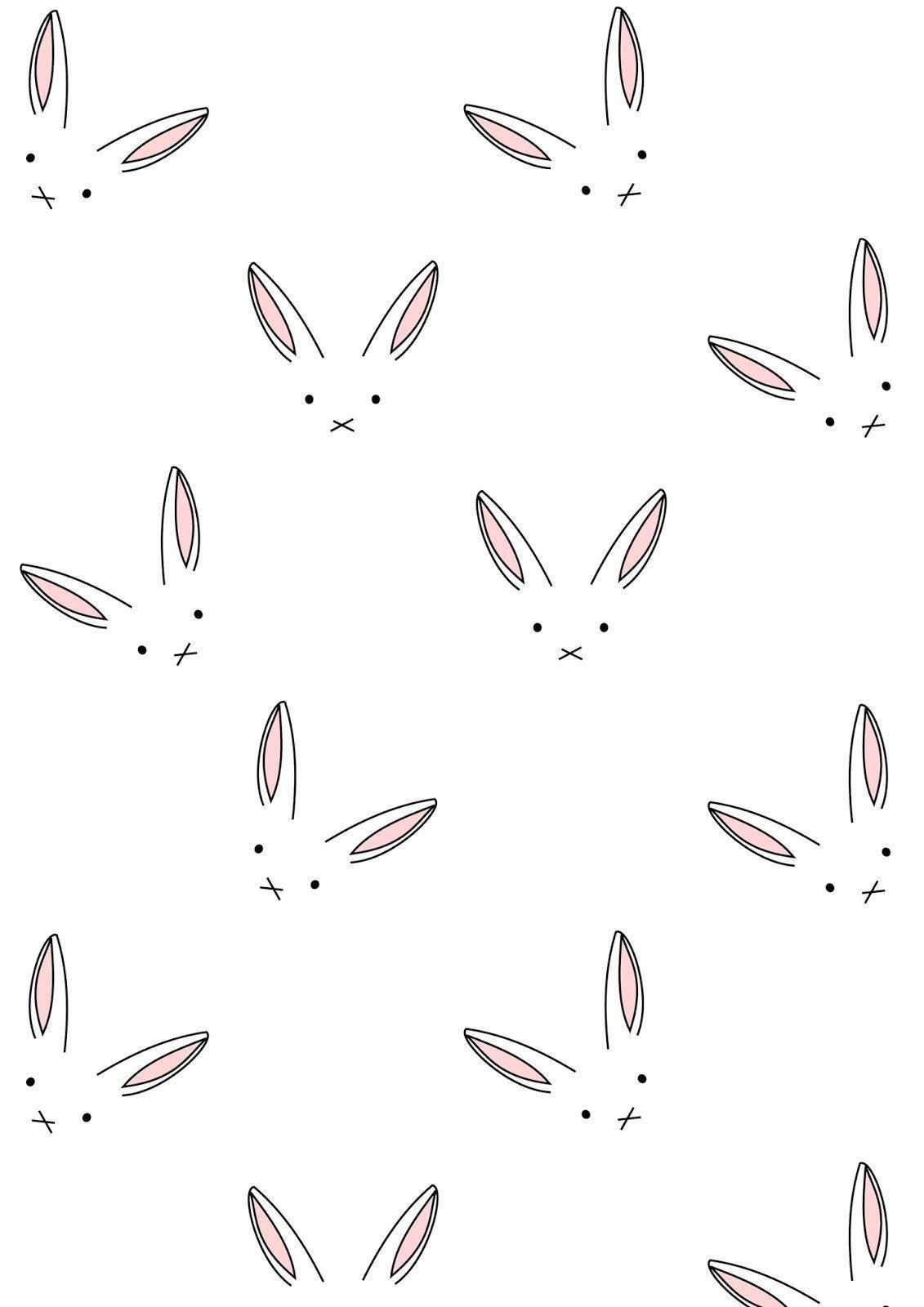 Cute Bunny Faces On White Wallpaper