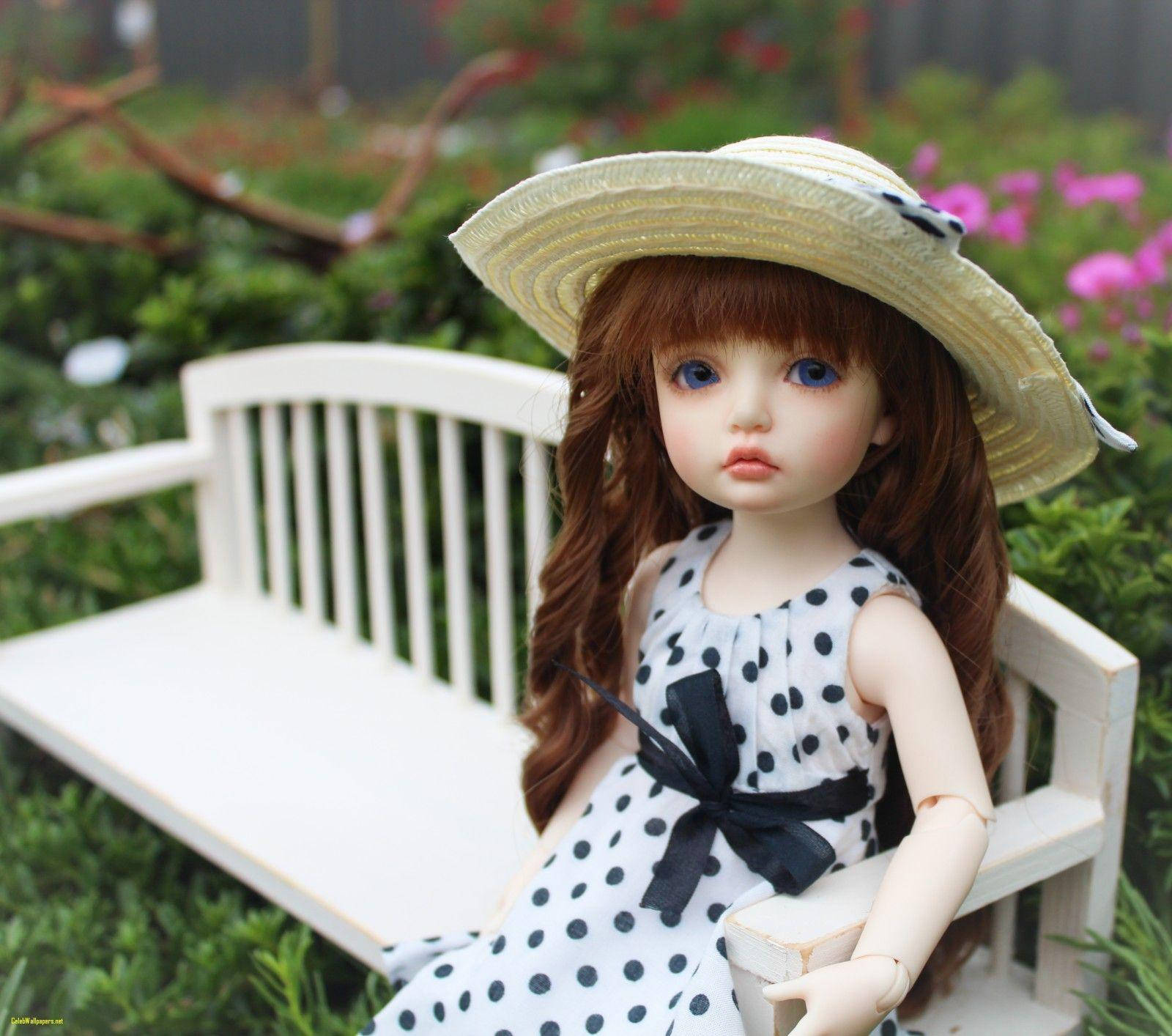 Cute Doll On Bench Wallpaper