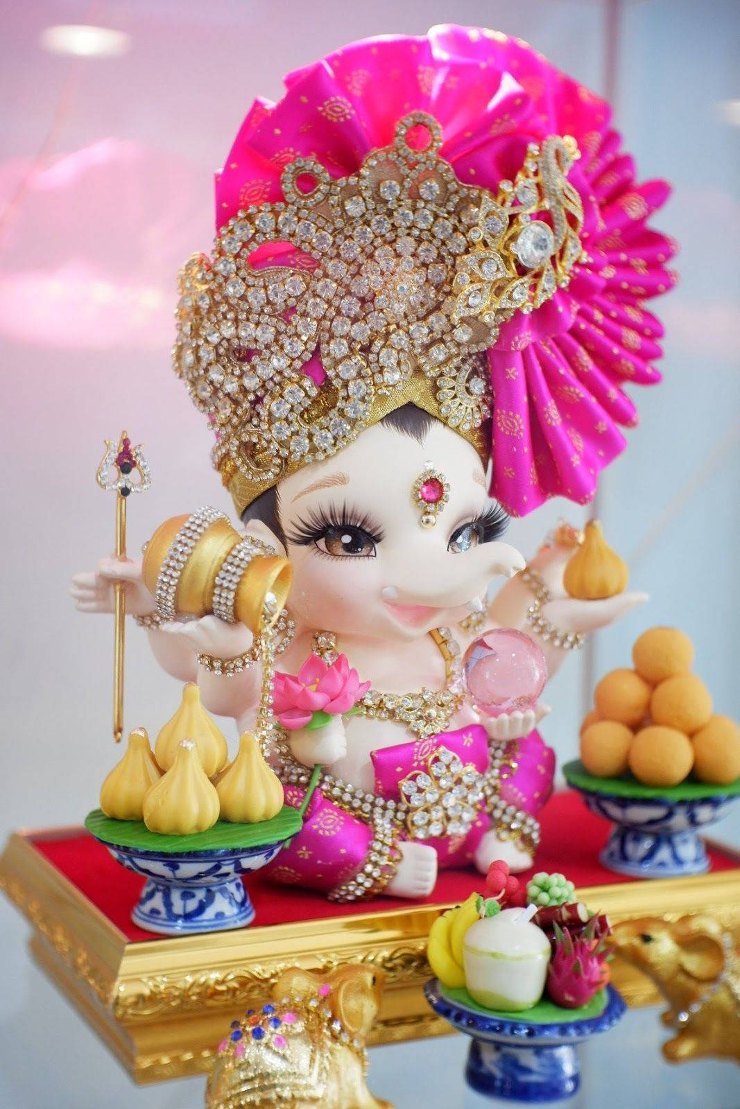 Cute Ganesha Baby In Pink Headdress Wallpaper