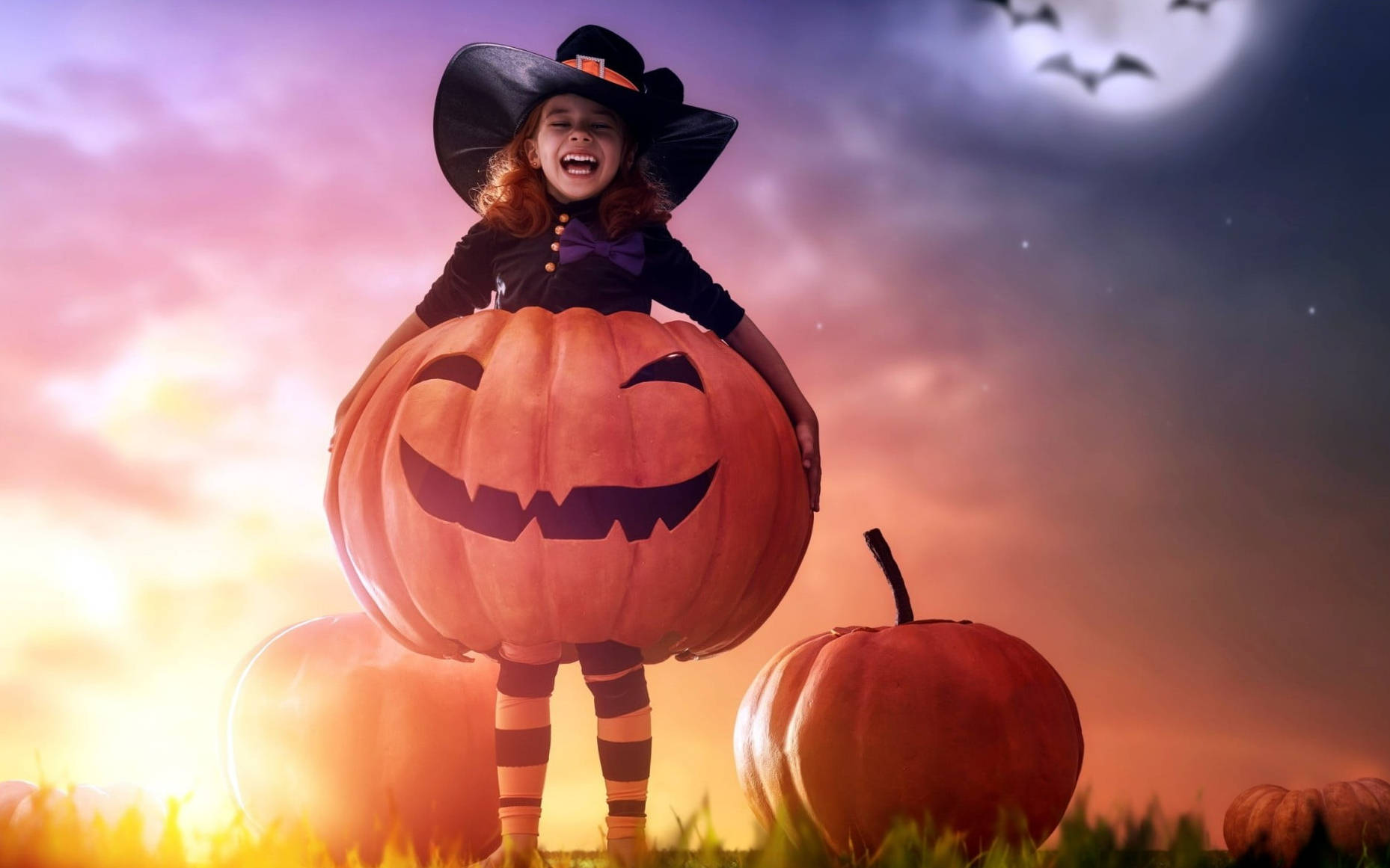 Cute Halloween Girl Laughing Wallpaper