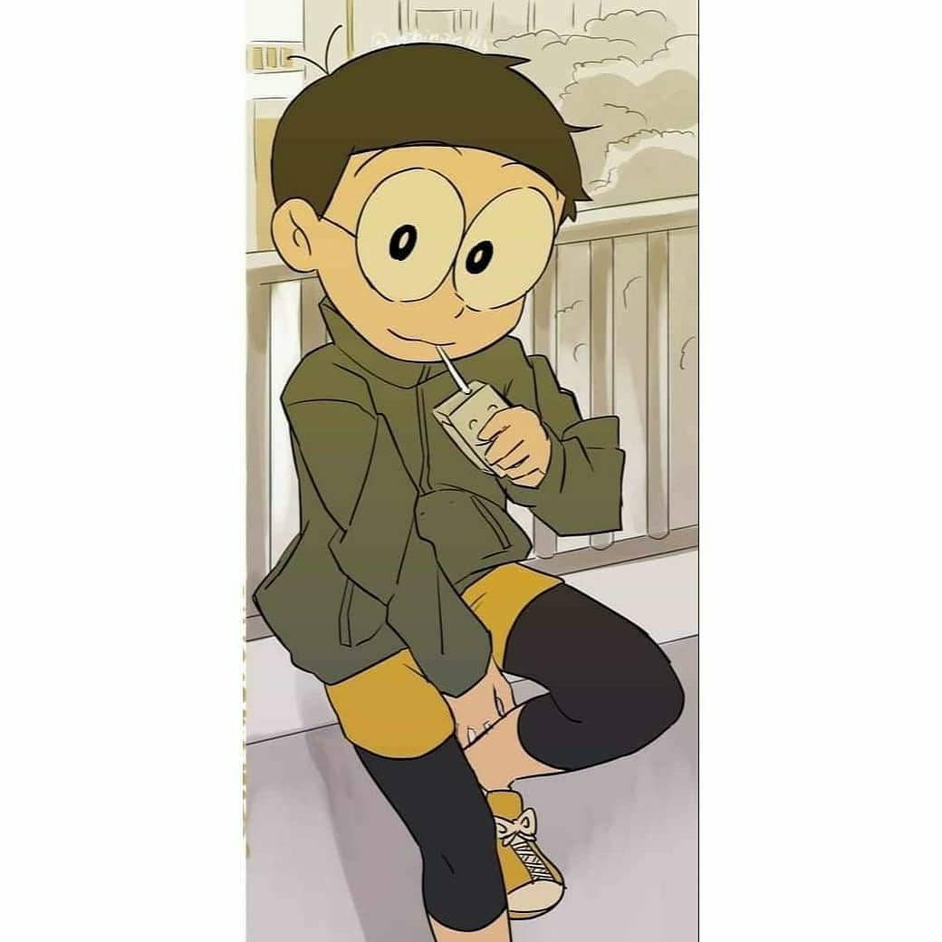 Cute Nobita Drinking Juice Wallpaper