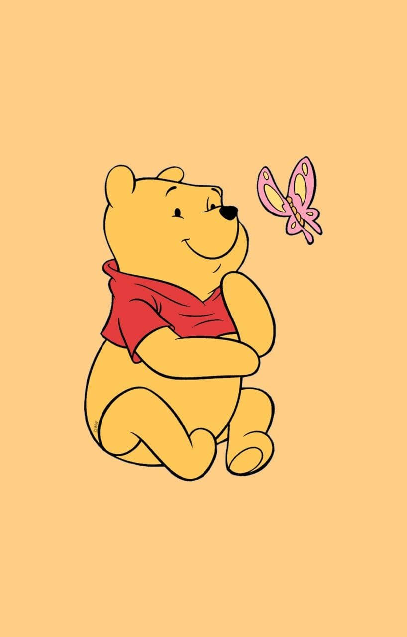 Cute Winnie The Pooh With Butterfly Wallpaper