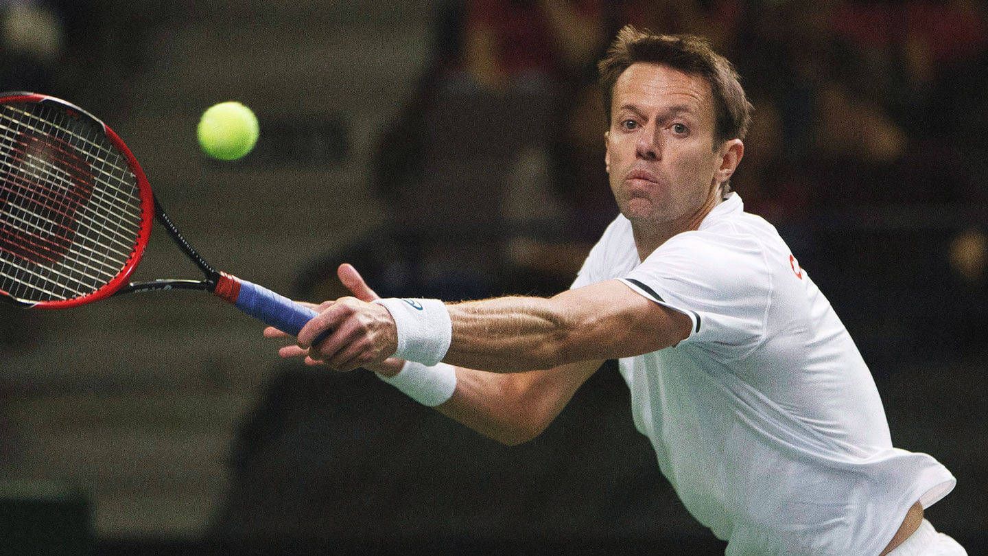 Daniel Nestor Lunging For Ball Wallpaper