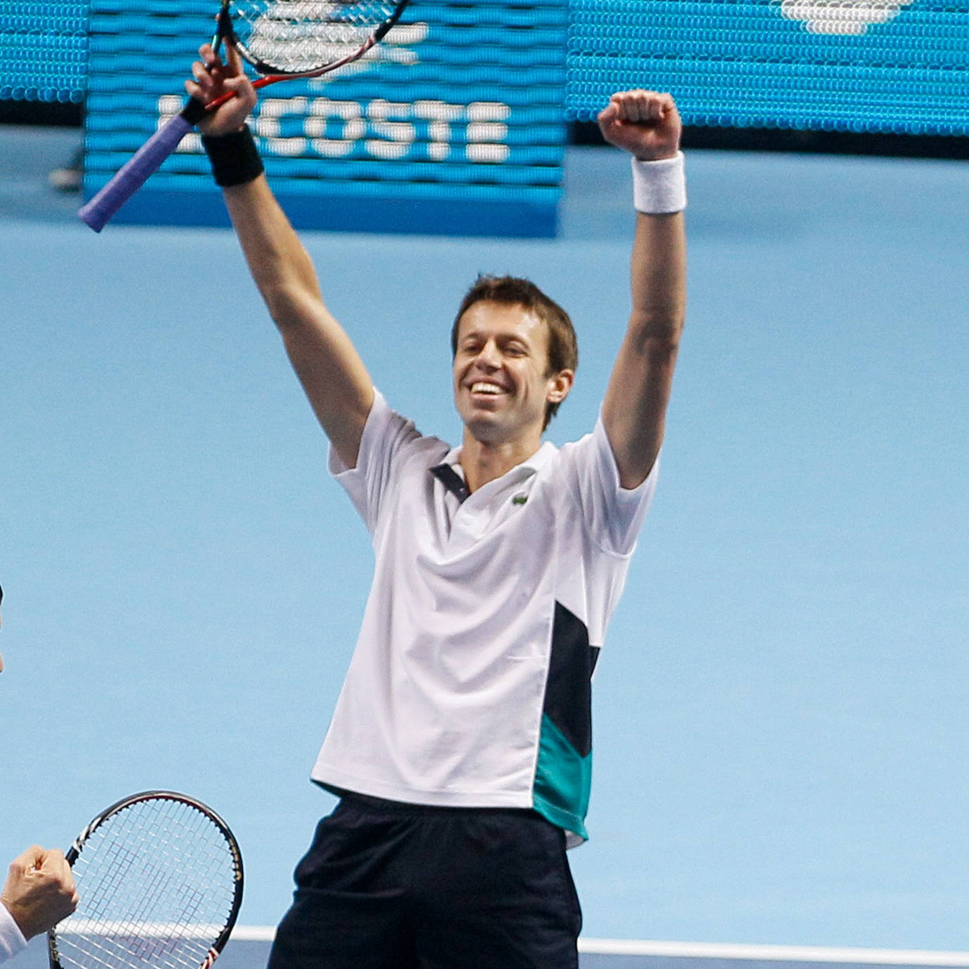 Daniel Nestor With Raised Arms Wallpaper