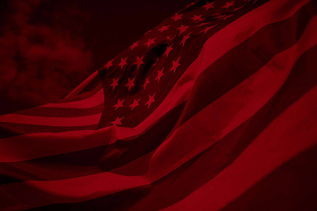 Dark American Flag Overlaid With A Red Filter Wallpaper