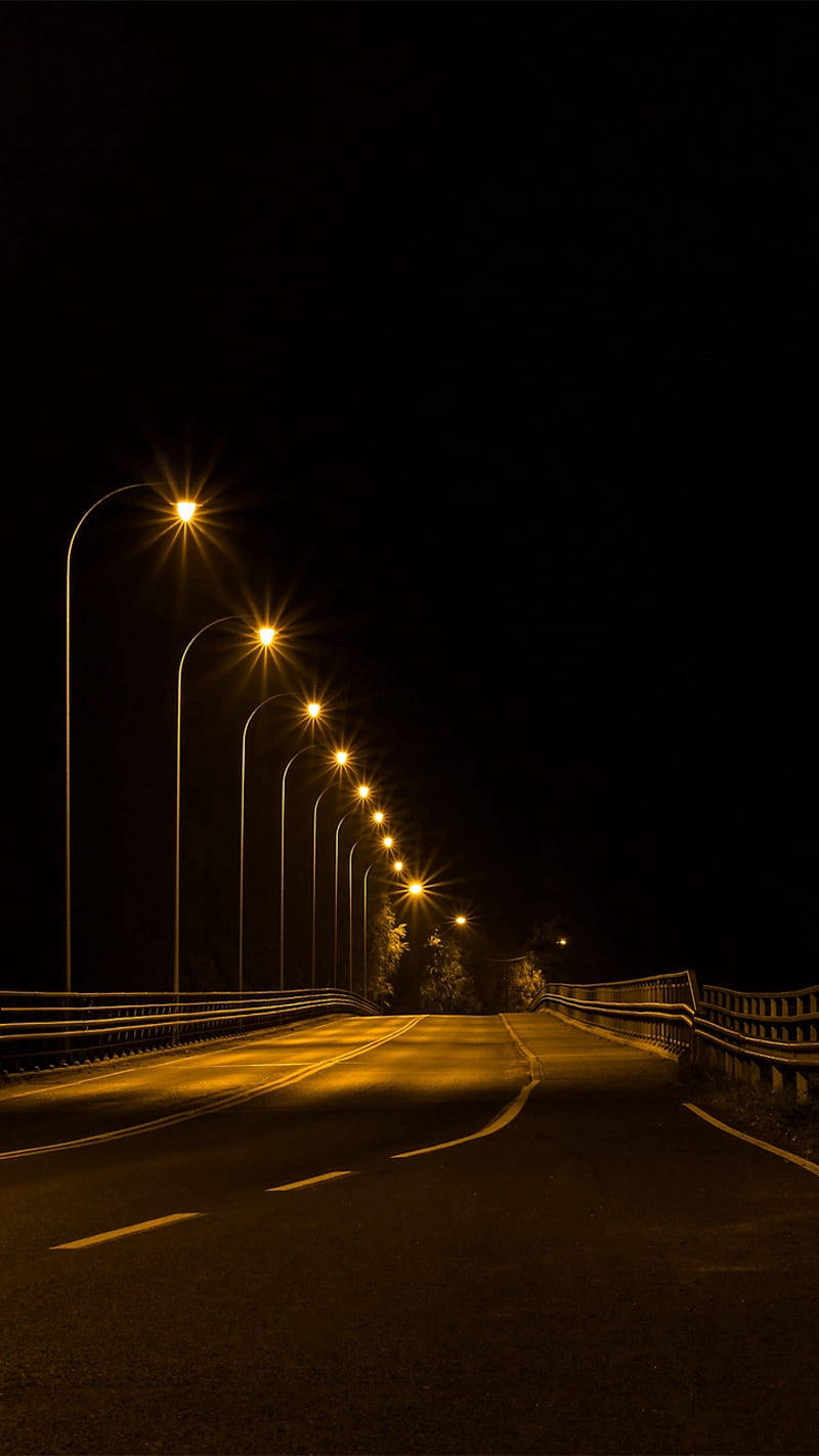 Dark Night Road With Street Lights Wallpaper
