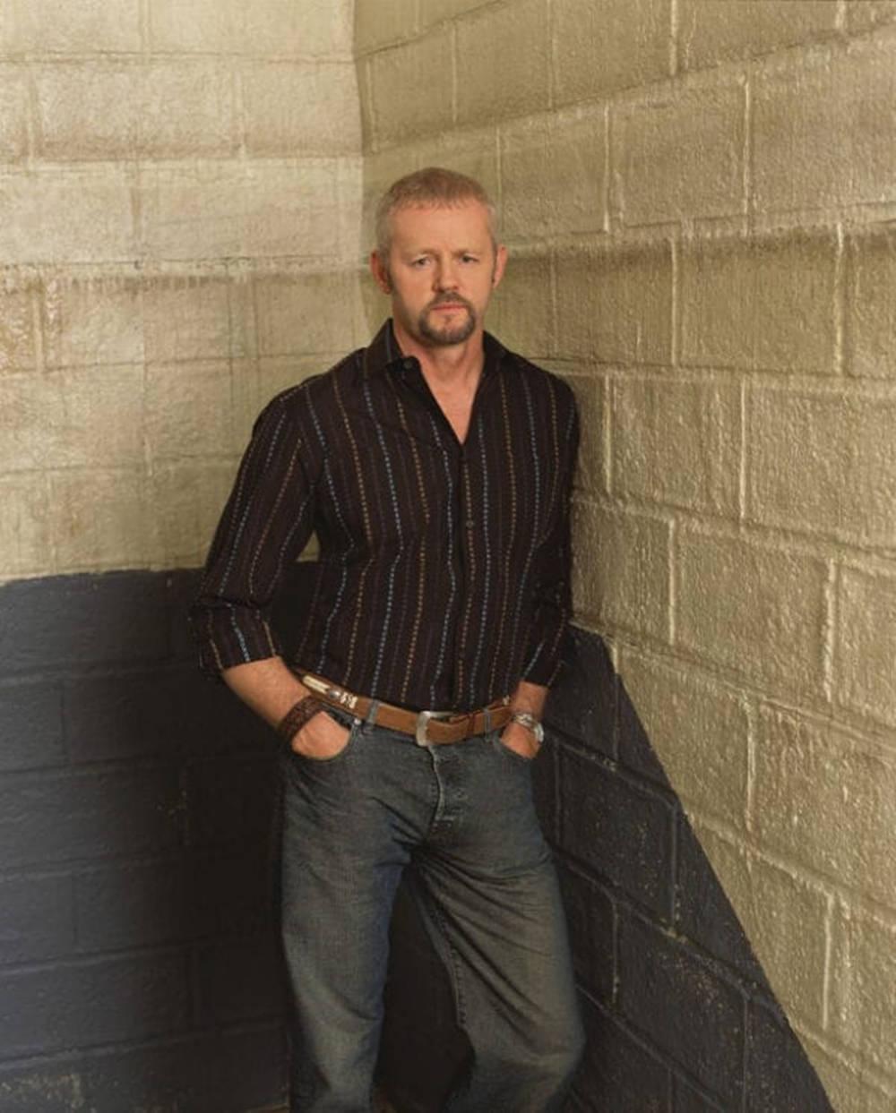 David Morse Cool Portrait In Striped Black Top Wallpaper