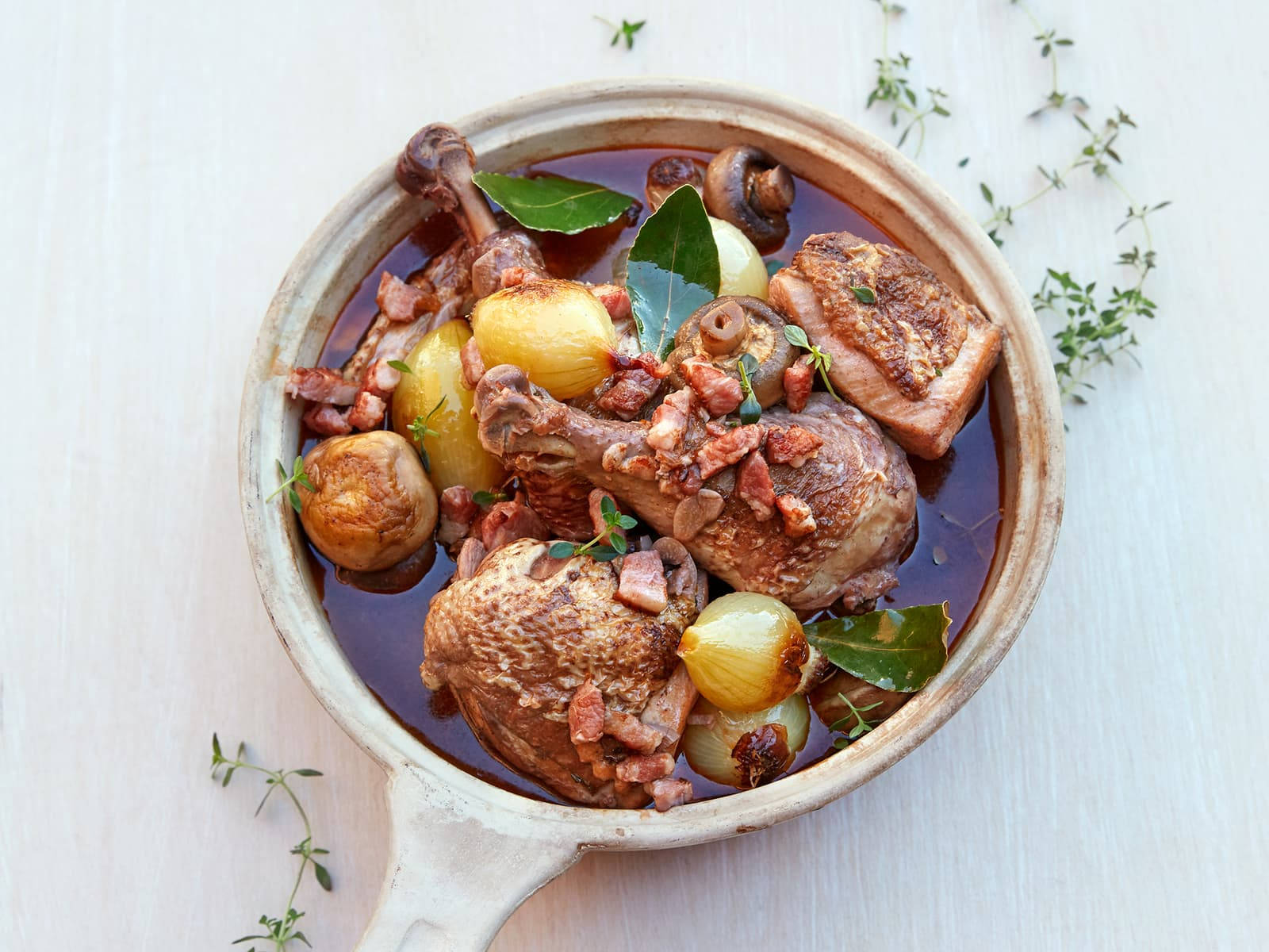 Delicious French Classic, Coq Au Vin In A Pan Wallpaper