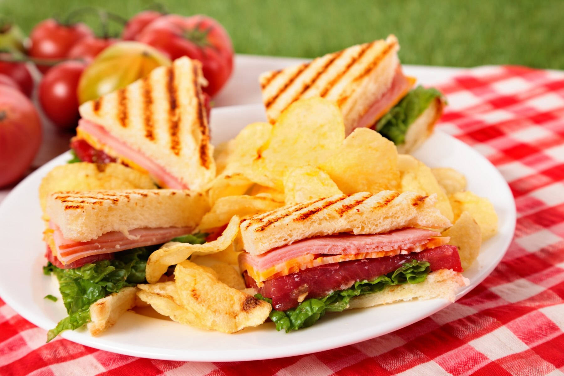 Delicious Grilled Sandwiches With Chips Wallpaper