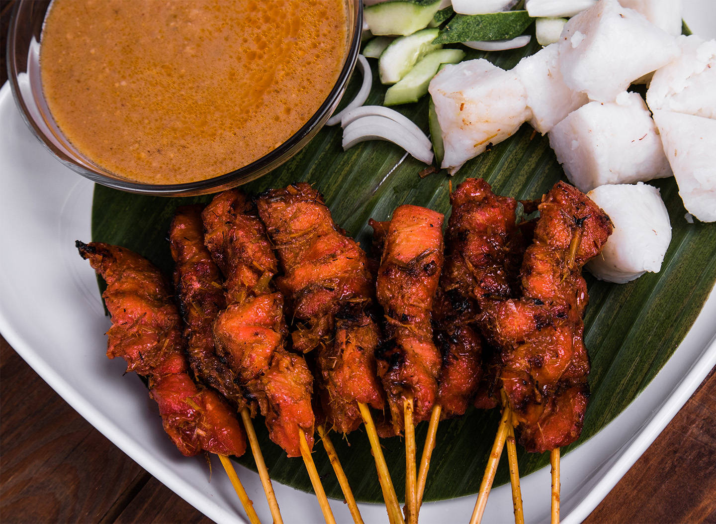 Delicious Pork Satay With Rice Cake Wallpaper