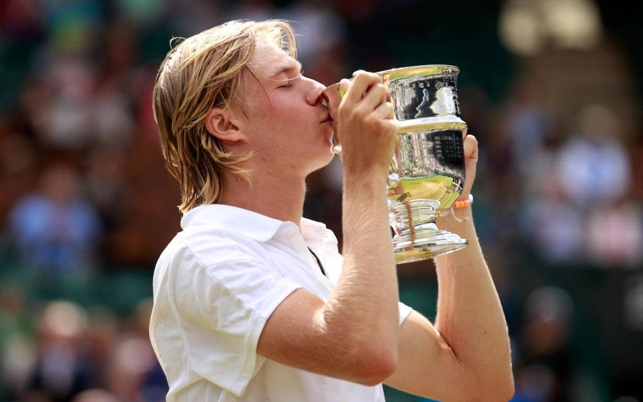 Denis Shapovalov Kissing Trophy Wallpaper