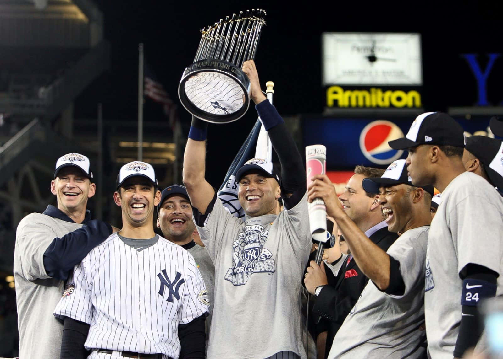 Derek Jeter Raising World Series Throphy Wallpaper