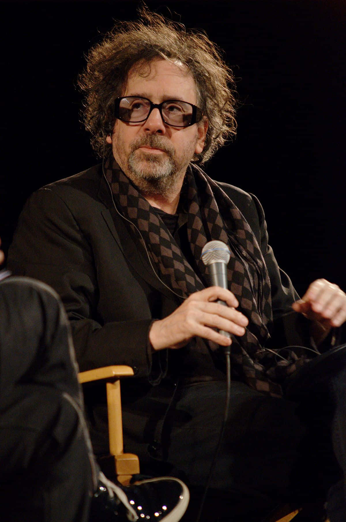 Director Tim Burton Smiles For The Camera Wallpaper