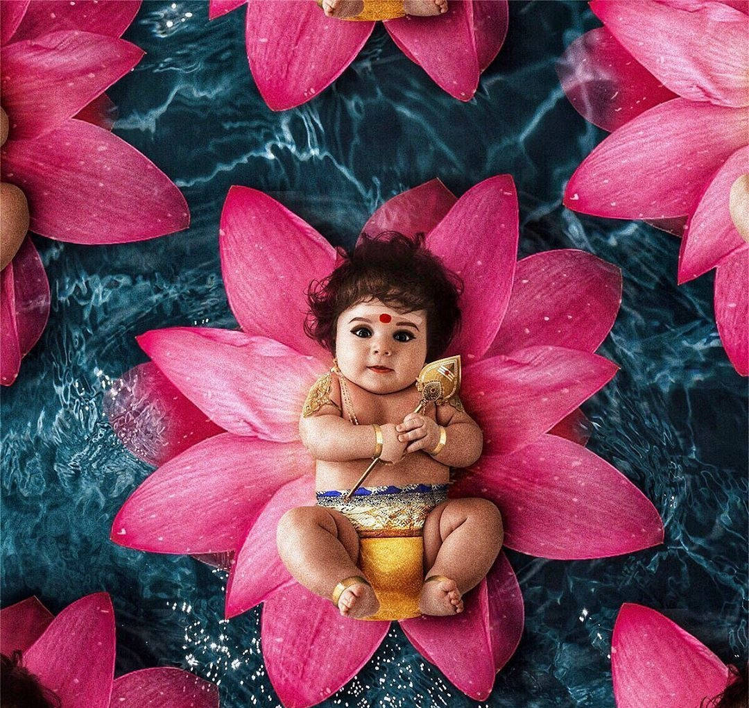 Divine Baby Murugan Resting On A Pink Flower Wallpaper