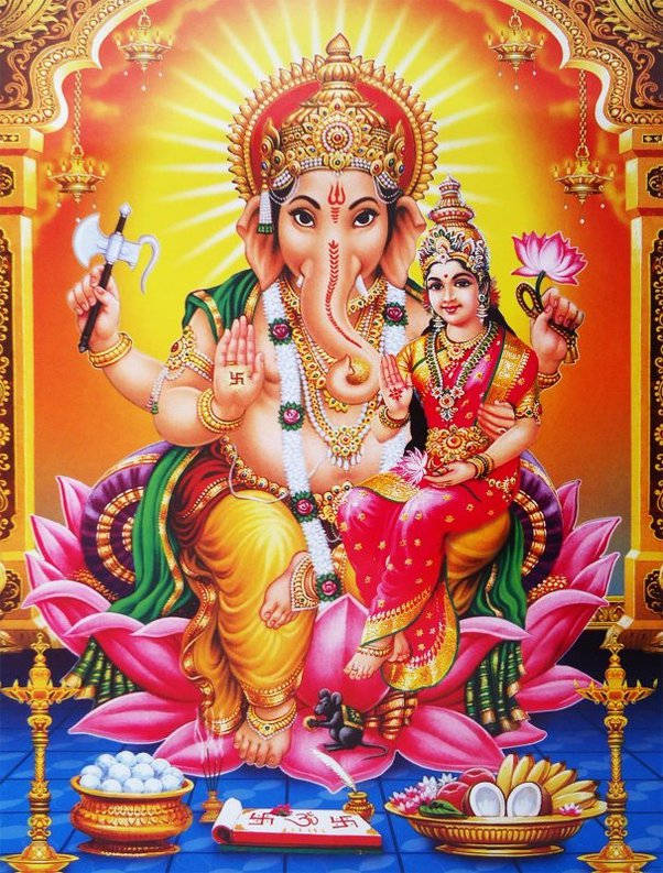 Divine Blessings - Lord Ganesh With Goddess Lakshmi Wallpaper