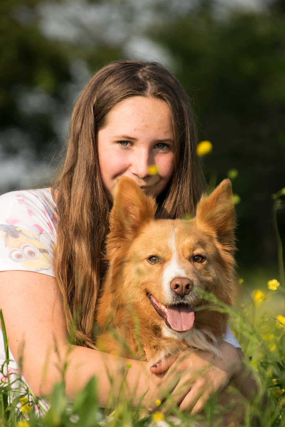 Dog And Girl Looking At The Camera Wallpaper