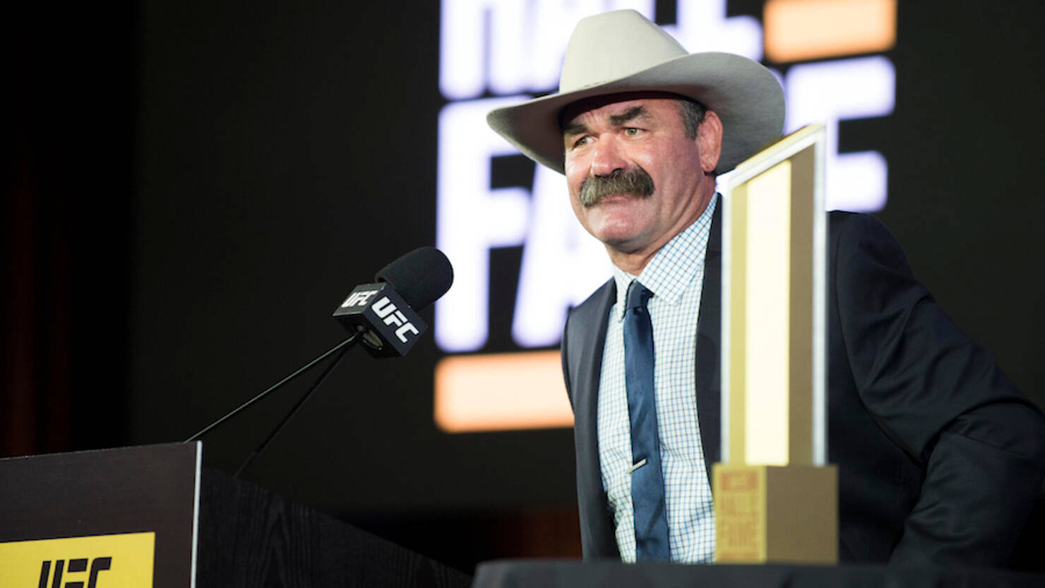 Don Frye At Ufc Hall Of Fame With Trophy Wallpaper