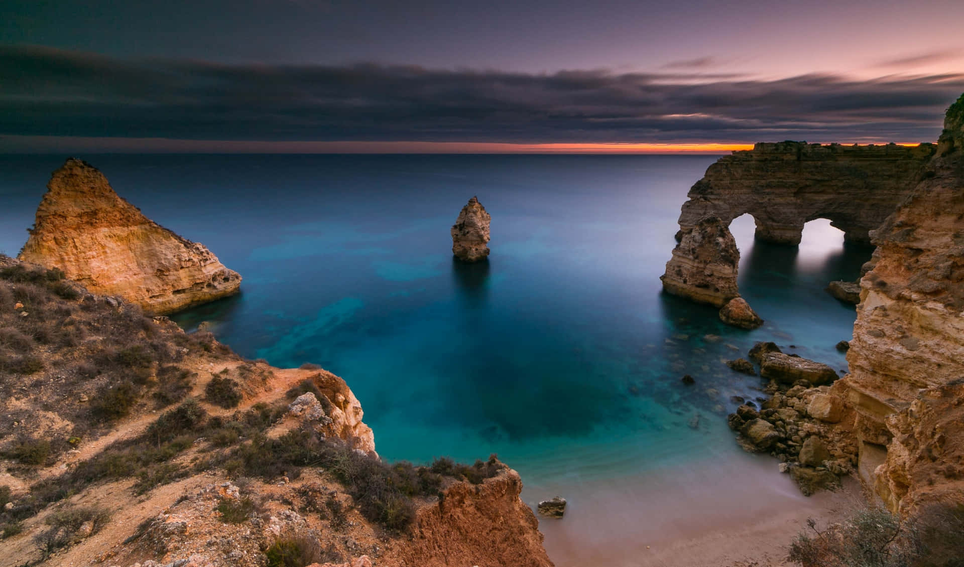 Double Arch By The Sea Wallpaper