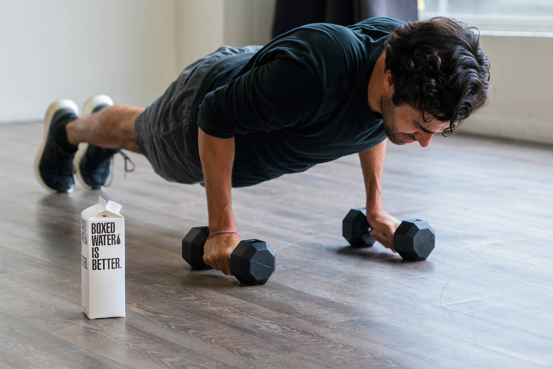 Premium Photo | Coach bodybuilding performs push ups.