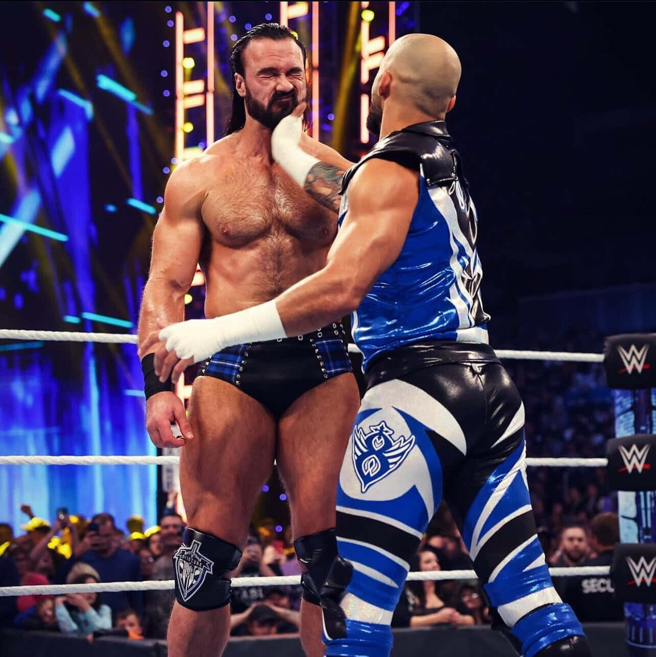 Drew Mcintyre Versus Ricochet Intense Wwe Match. Wallpaper