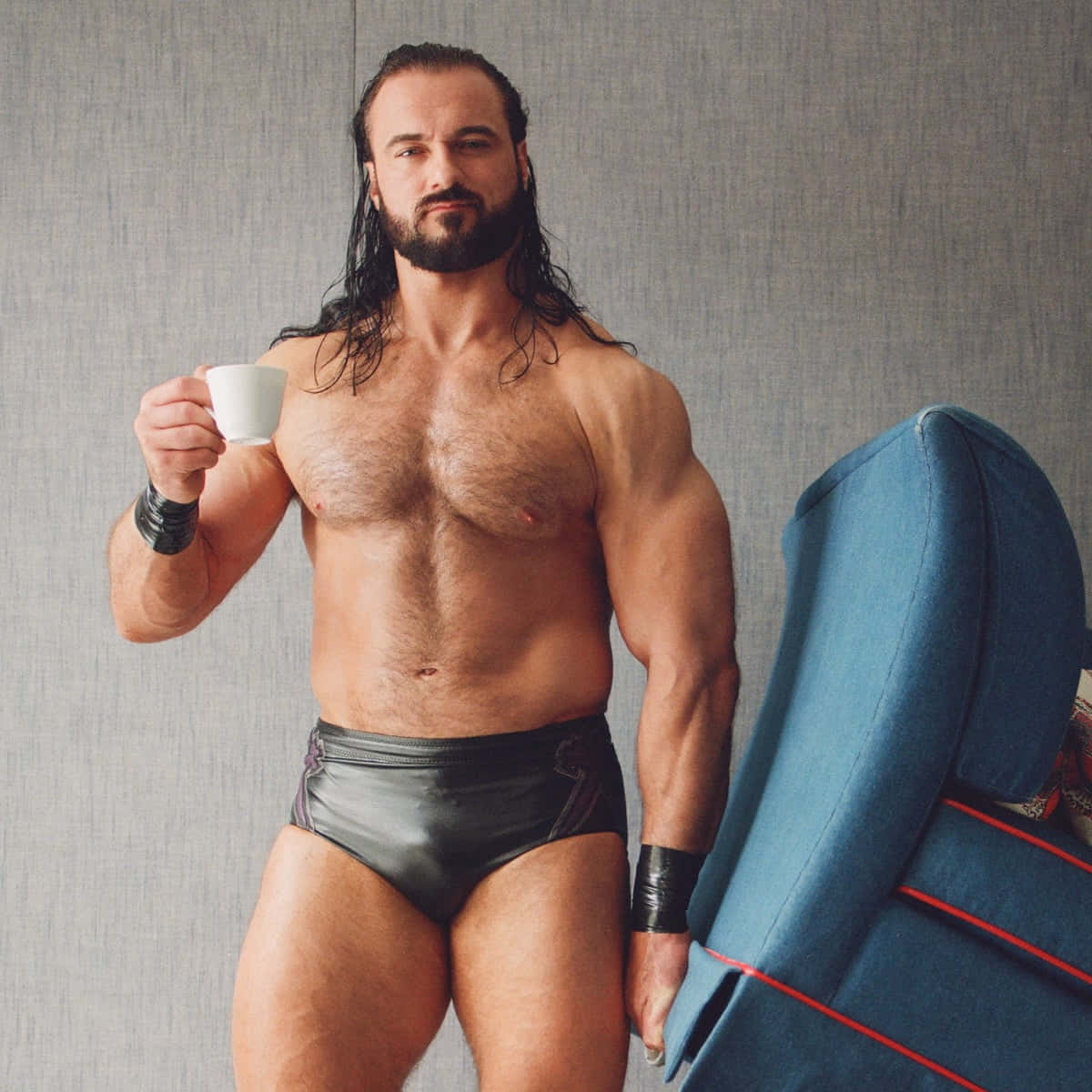 Drew Mcintyre Wrestler With Coffee Wallpaper