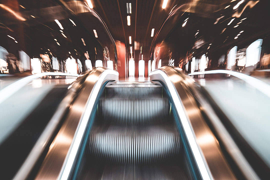 Dynamic Escalator In Motion Wallpaper