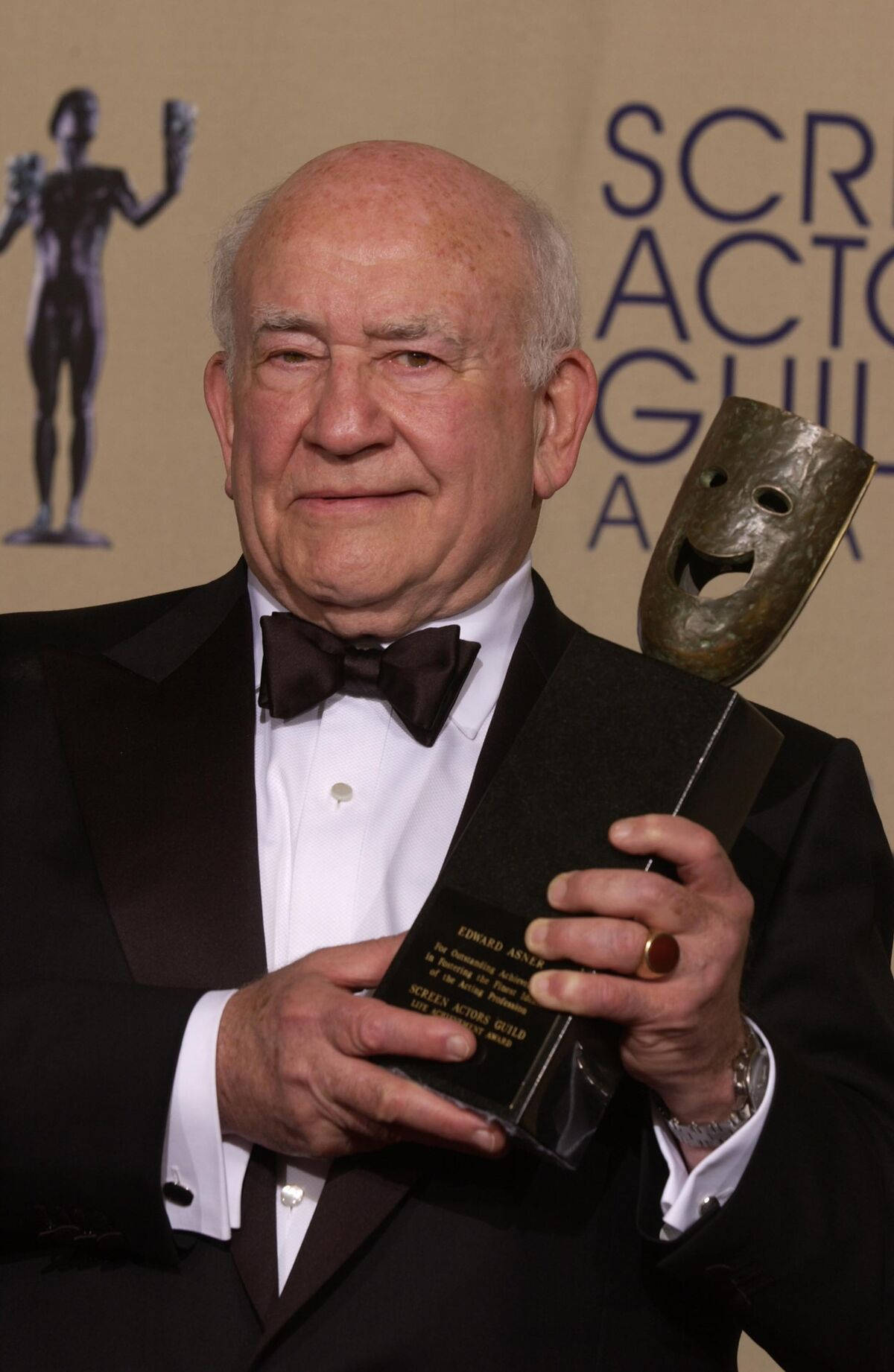 Edward Asner Holding Trophy Wallpaper