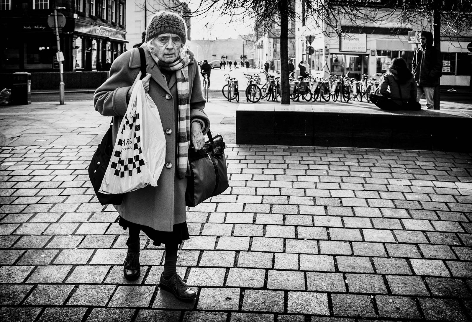 Elderly Woman In The Street Wallpaper