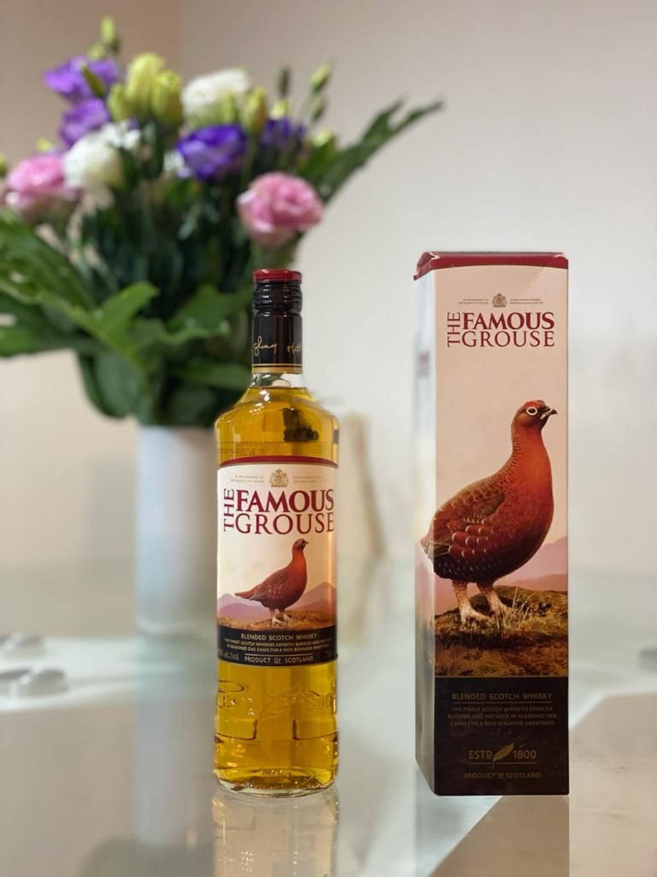 Elegance In A Bottle - Famous Grouse Scotch Whisky Wallpaper