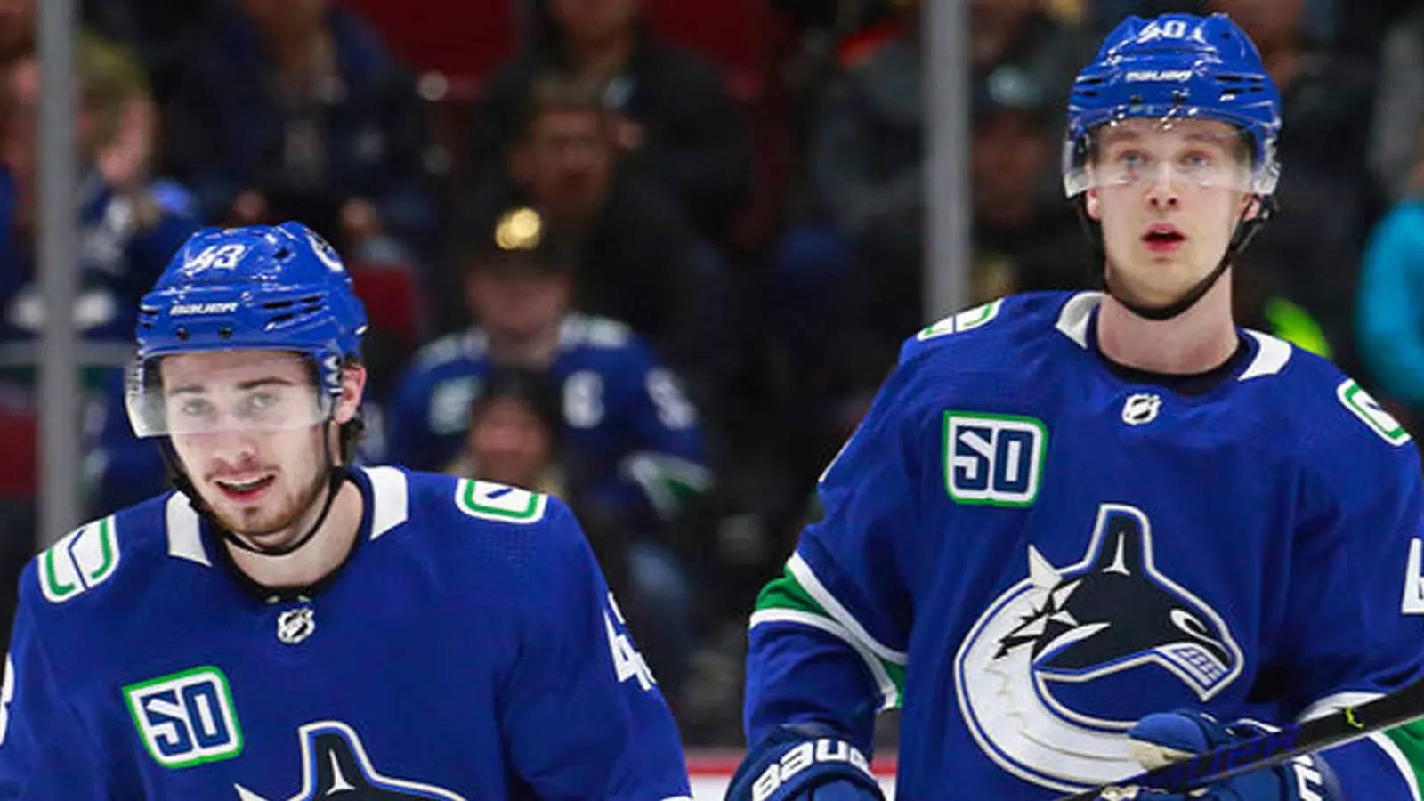 Elias Pettersson With Quinn Hughes Wallpaper