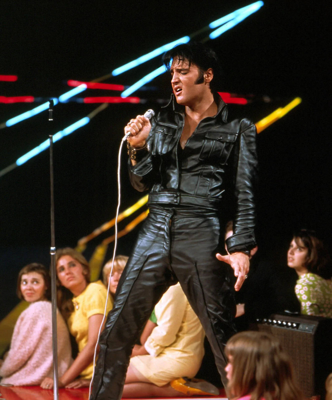 Elvis Presley In Leather Attire Wallpaper