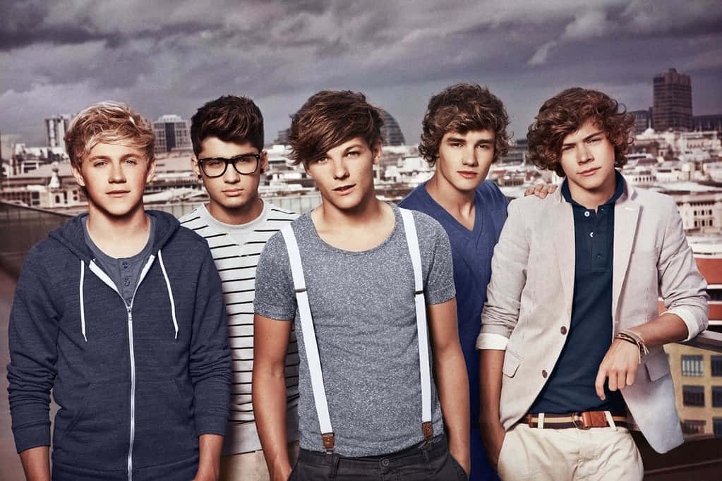 Embark On A Digital Journey With A One Direction Laptop Wallpaper