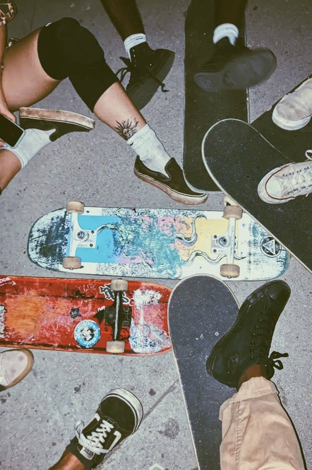 Embracing The Skater Lifestyle: Skate Shoes On Skateboards Wallpaper