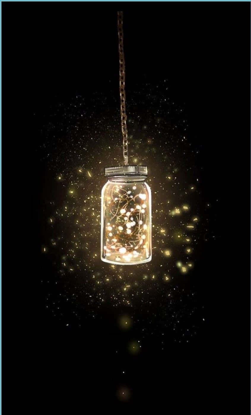 Enchanting Glow In Darkness - Fairy Lights In A Jar Wallpaper