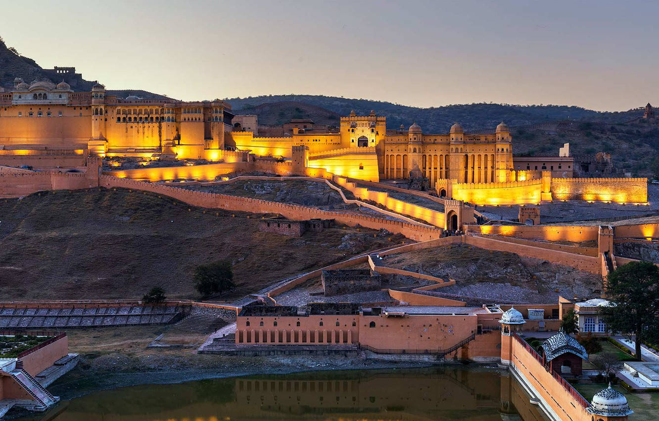 Enchanting View Of The Illuminated Amber Palace - Jaipur Wallpaper