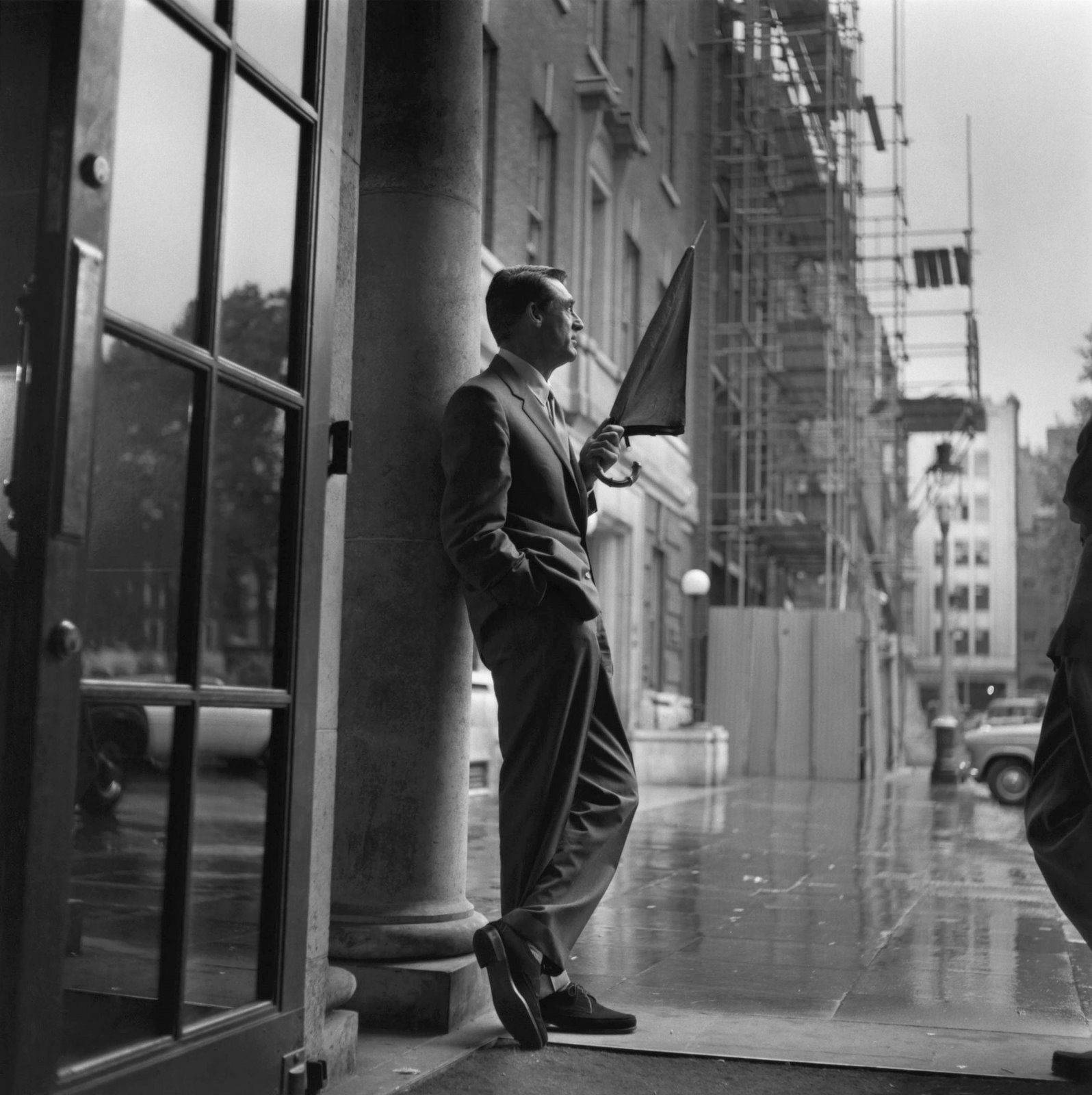English-american Actor Cary Grant In Rain Wallpaper