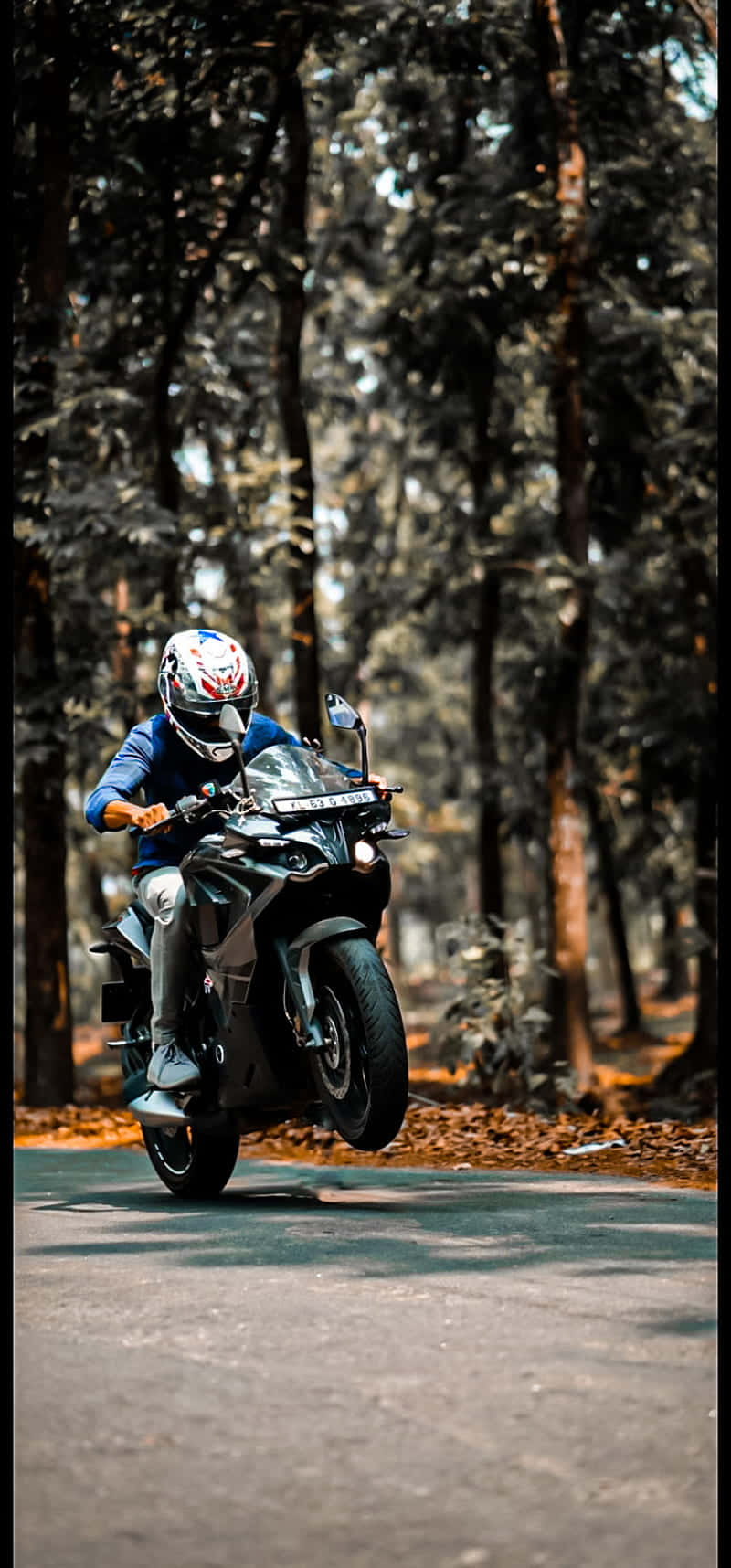 Enjoy The Freedom Of The Open Road With A Beautiful Hd Motorcycle. Wallpaper