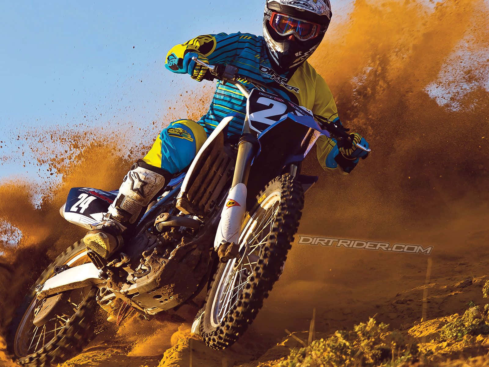 Enjoy The Rush Of A Honda Dirt Bike Wallpaper