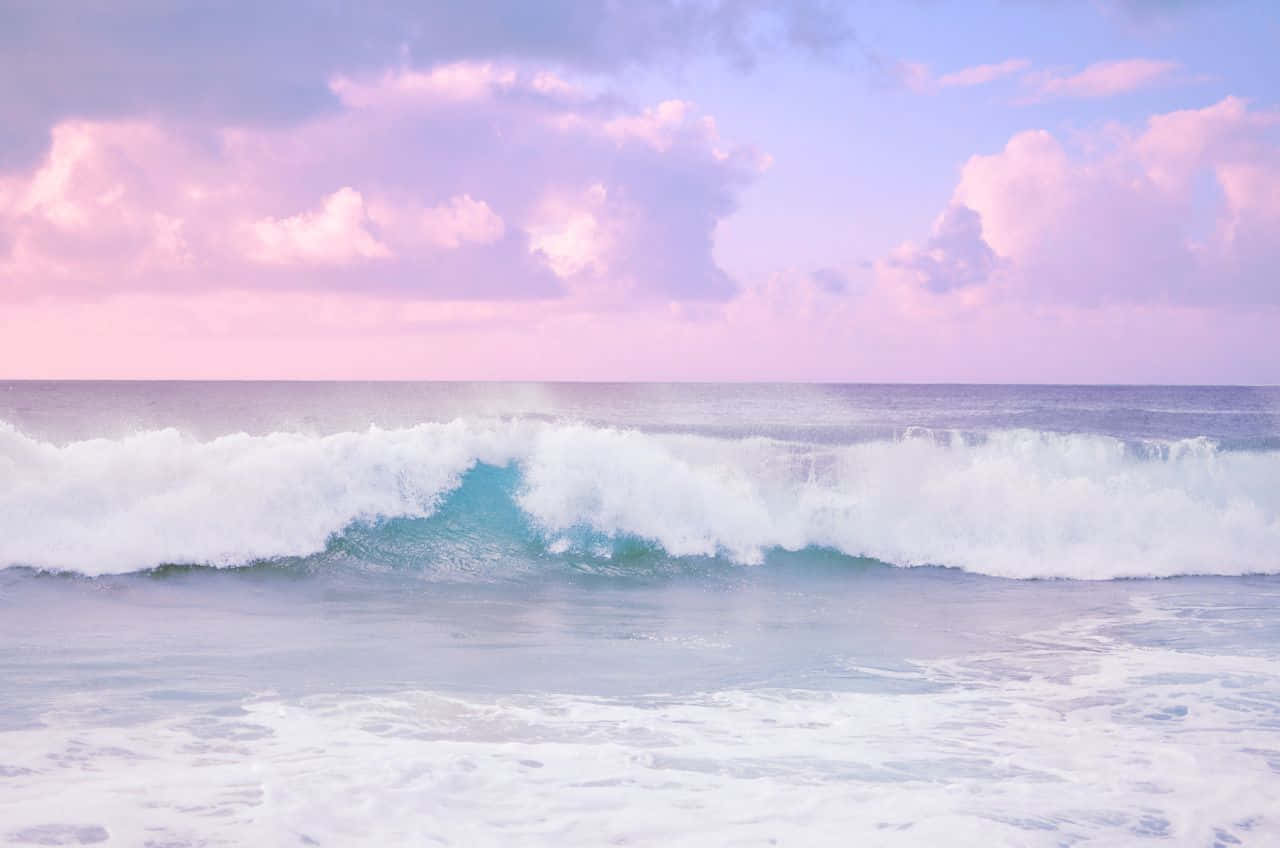 Enjoying A Relaxing Day At A Serene Pastel Beach Wallpaper