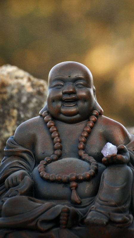 Enlightening Laughing Buddha Holding Pure Crystal Wallpaper
