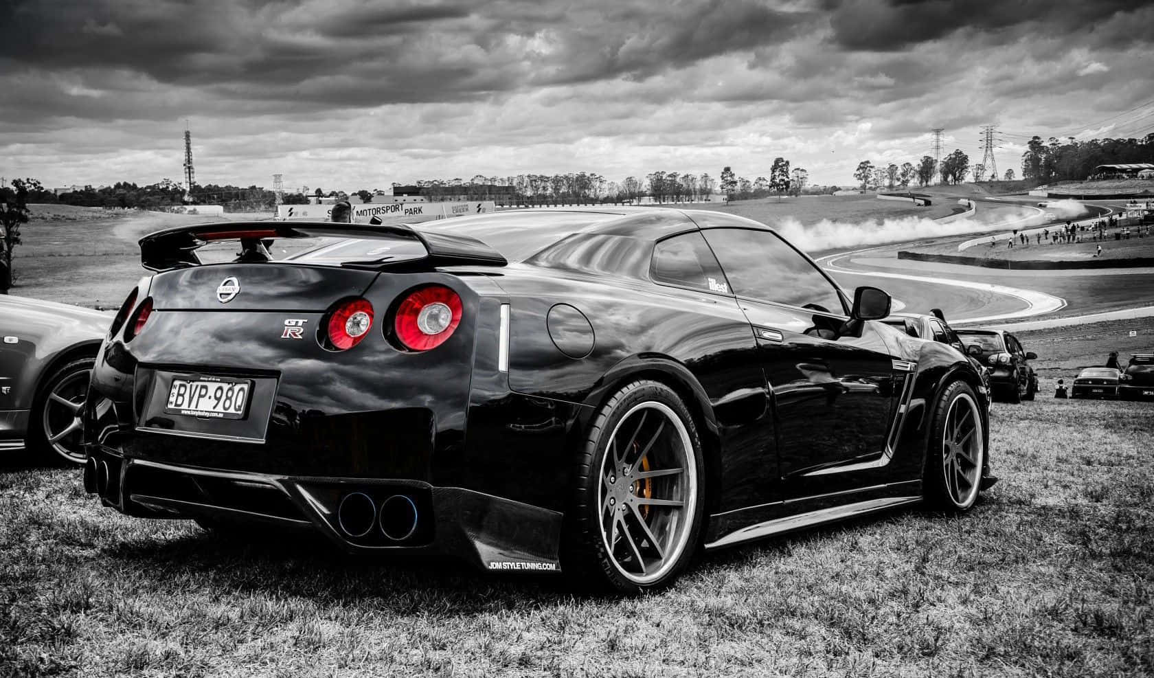 Experience The Pure Exhilaration Of Speeding Down The Highway In The Stylish Cool Gtr. Wallpaper