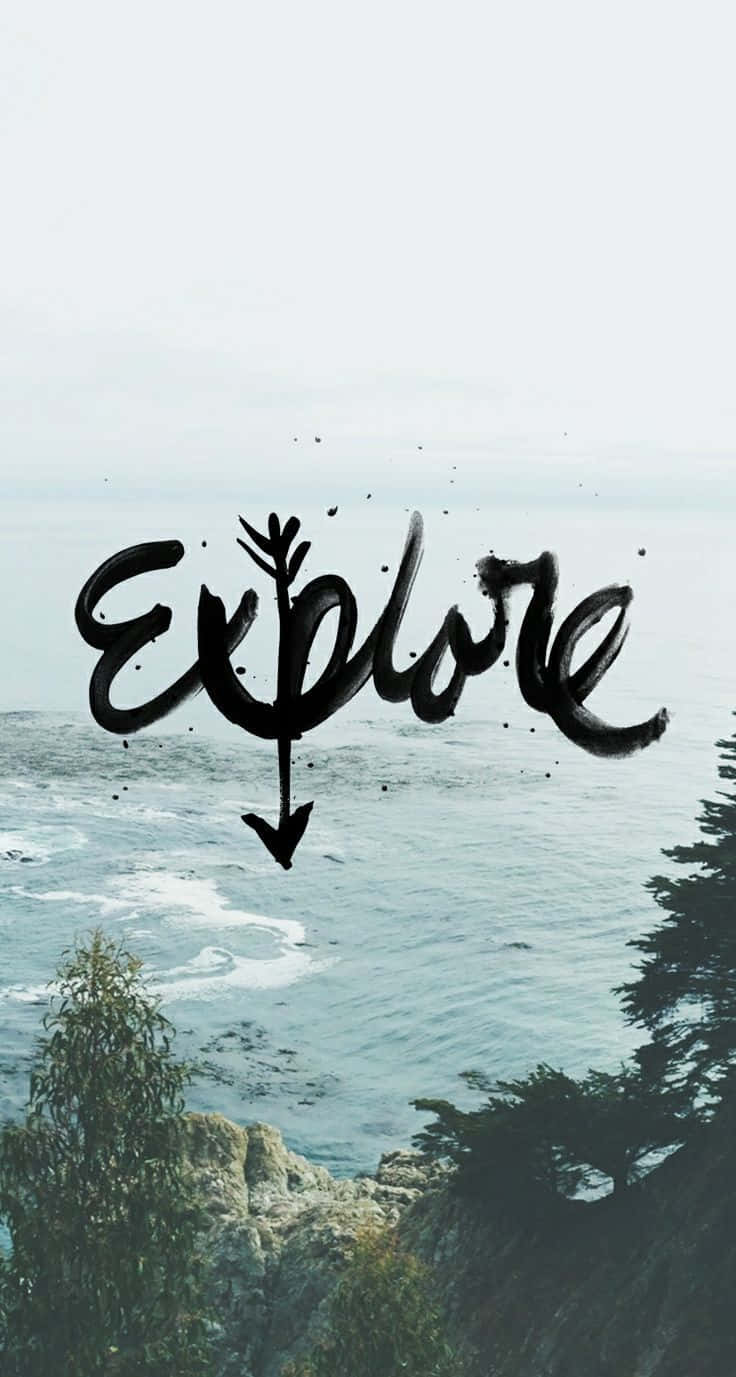 Explore - A Black And White Photo Of A Tree And Ocean Wallpaper