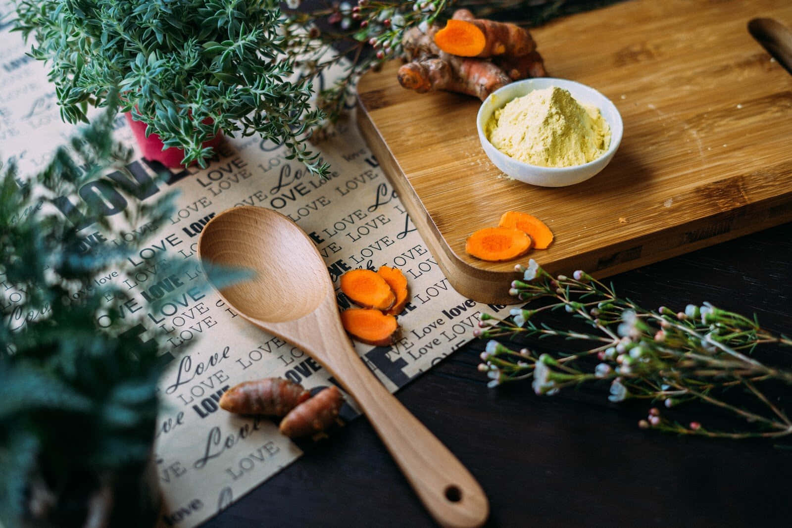 Exquisite Turmeric Spices On Chopping Board Wallpaper