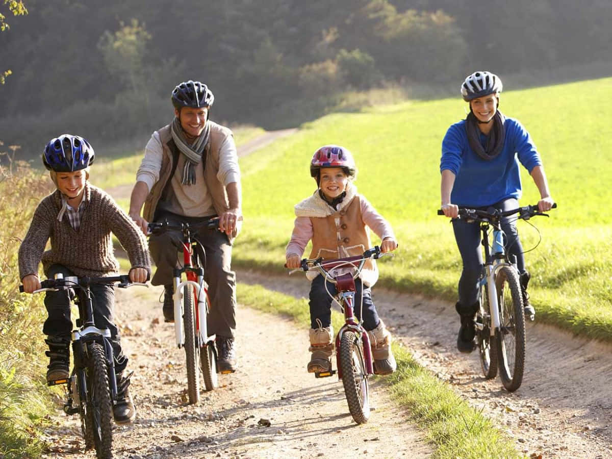 Family On Bike Ride Wallpaper