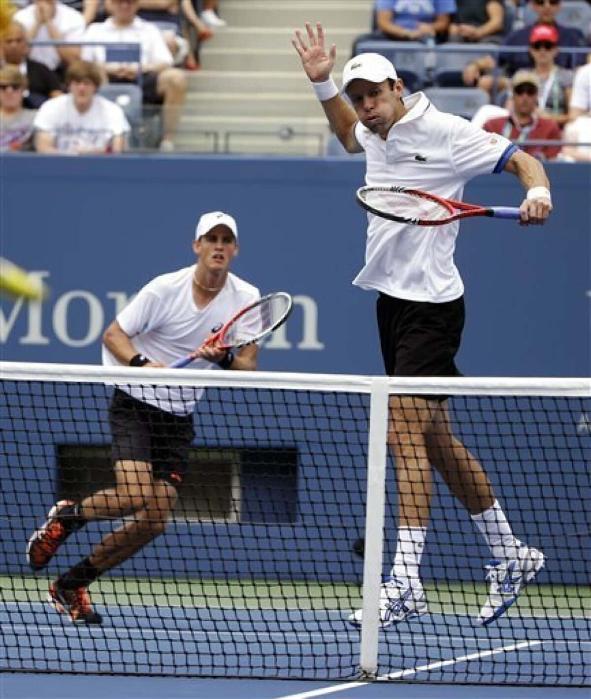 Famous Tennis Player Daniel Nestor With His Partner At The Us Open Wallpaper