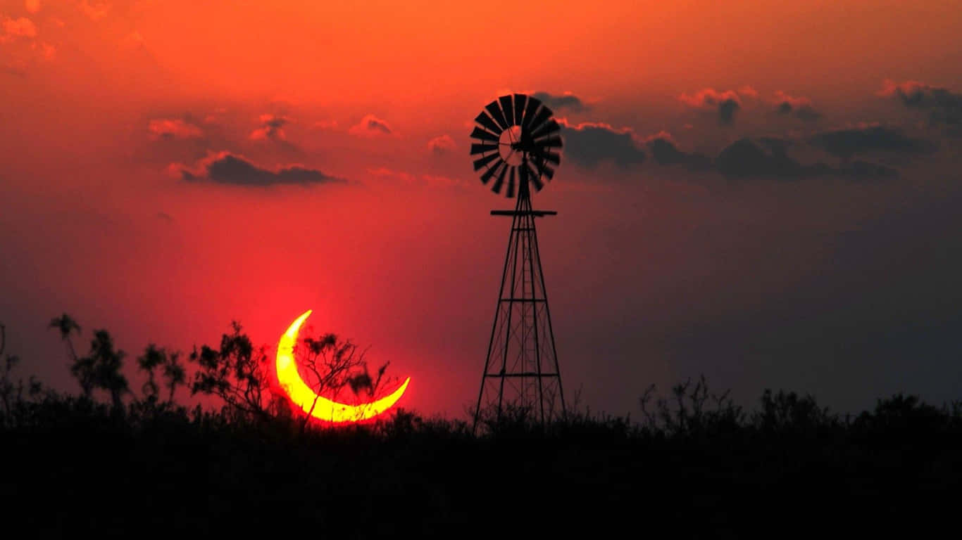 Farm Windmill Under Evening Sky Wallpaper