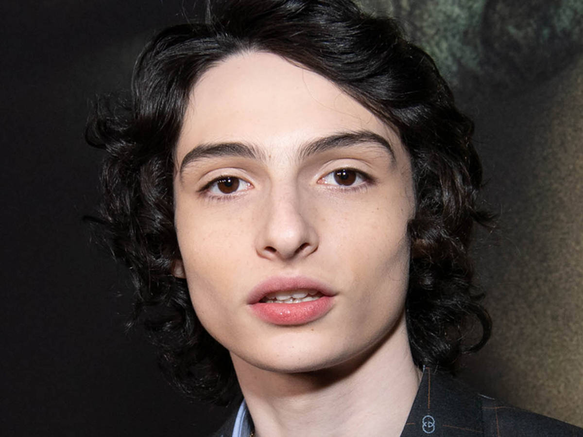 Finn Wolfhard Red Carpet Portrait Wallpaper