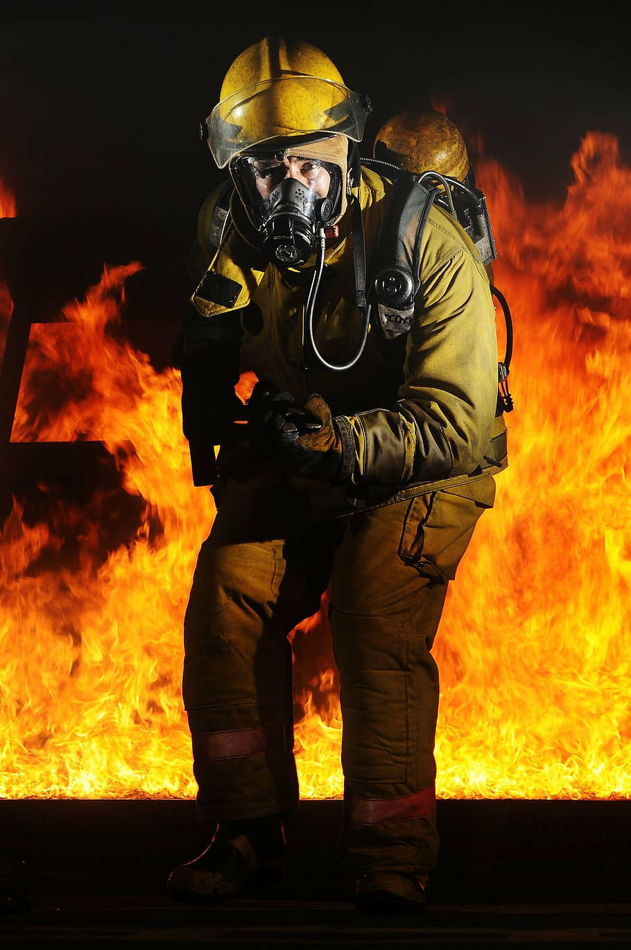 Fireman Leaving From A Huge Fire Wallpaper