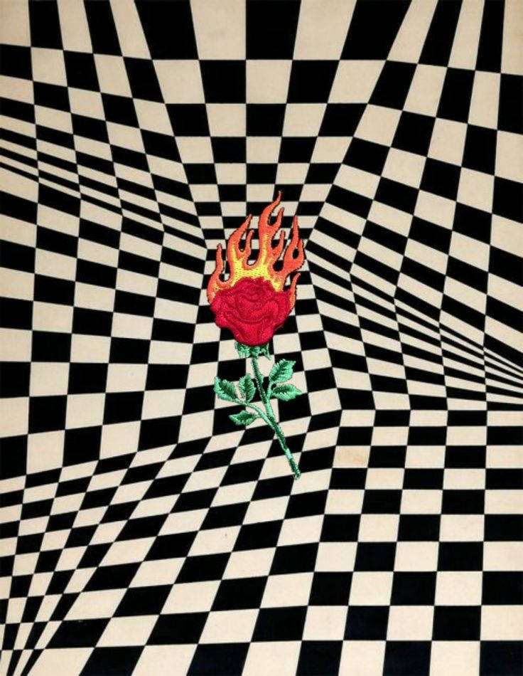 Flaming Rose Adorned Over Distorted Black And White Squares Wallpaper